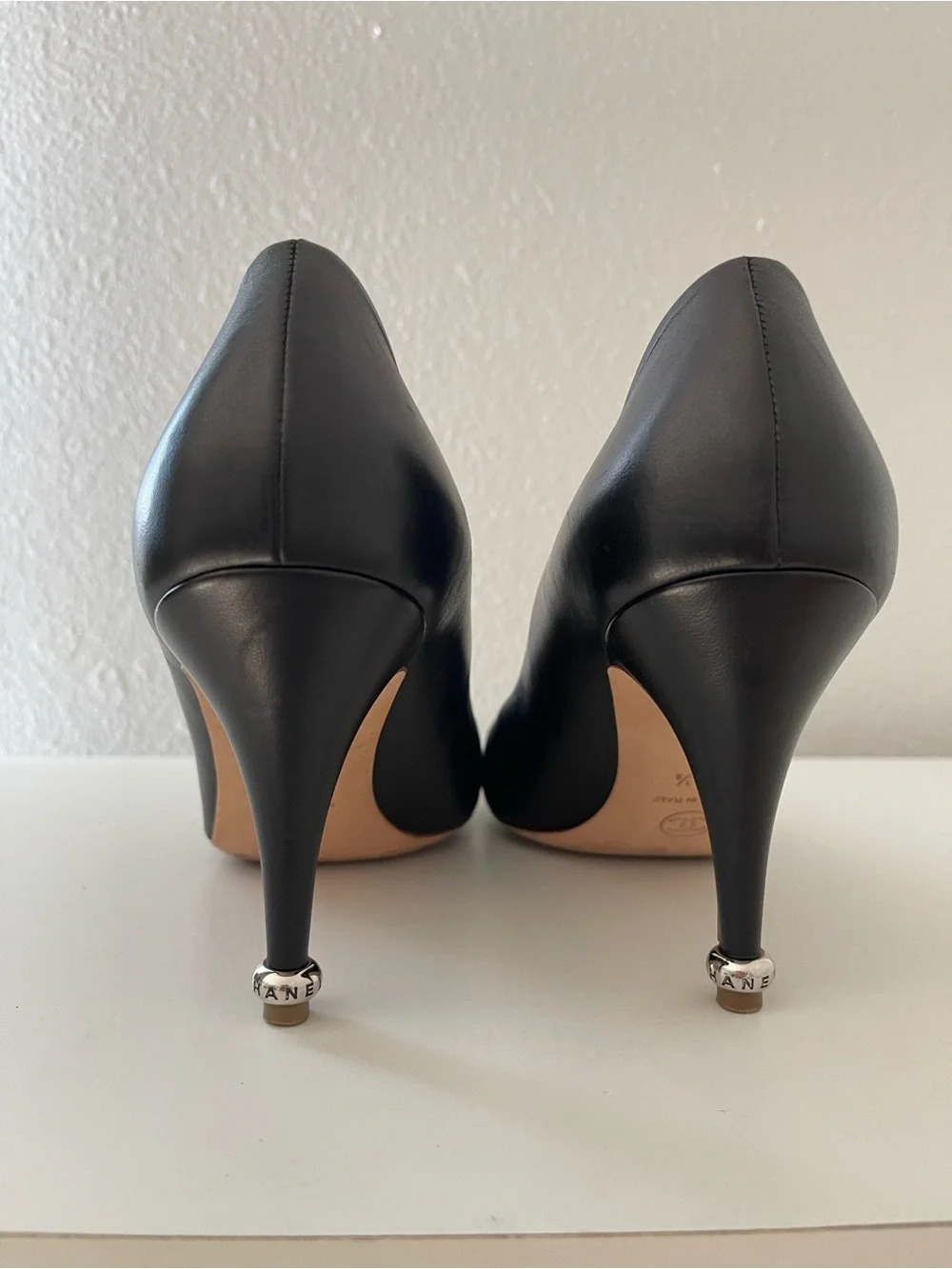 CHANEL Black Leather and Patent Cap-Toe Pump with CC Emblem